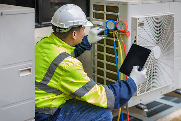 Professional Hvac technician working in Bagdad, AZ